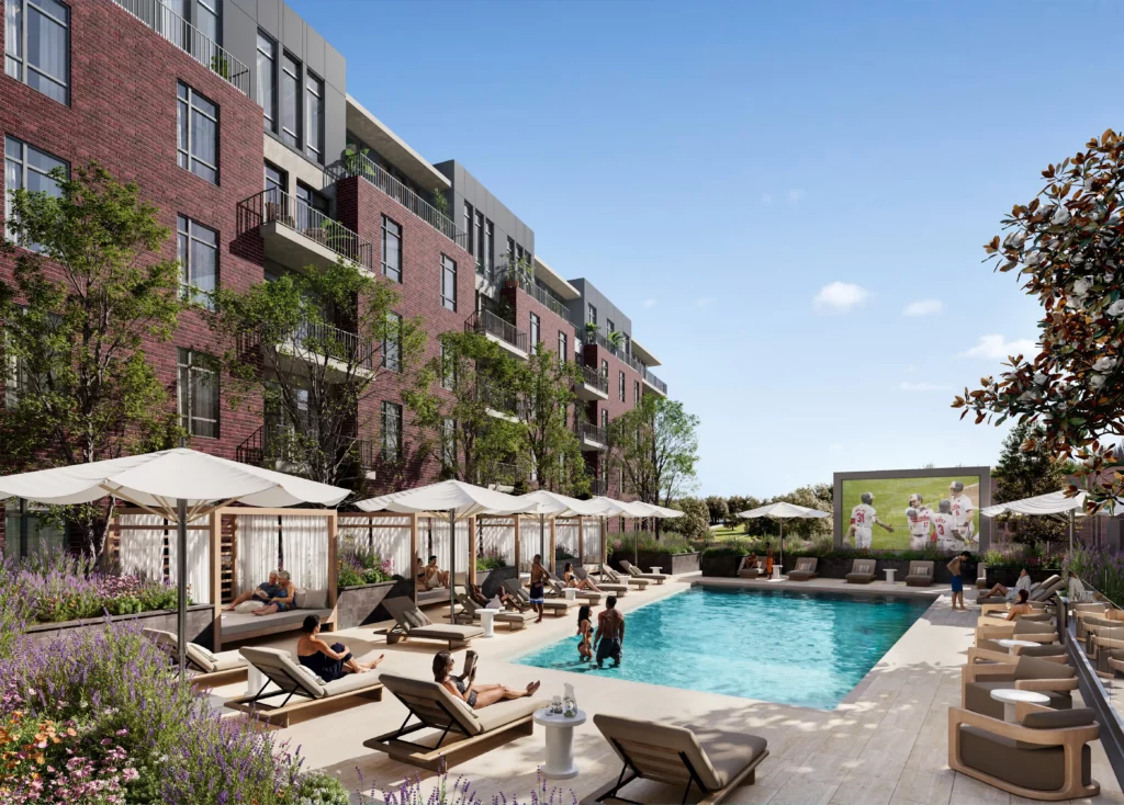 Outdoor swimming pool in luxury apartment complex with lounge chairs